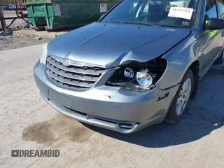 2010 Chrysler Sebring Touring with VIN 1C3CC4FB9AN190314, listed as a IAAI auction lot 41929715 with 102,939 mi miles and . Bid and sale history available at DreamBid. Image 6.