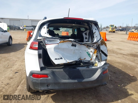 2014 Jeep Cherokee Latitude with VIN 1C4PJMCB1EW301011, listed as a IAAI auction lot 41777745 with 133,643 mi miles and . Bid and sale history available at DreamBid. Image 16.