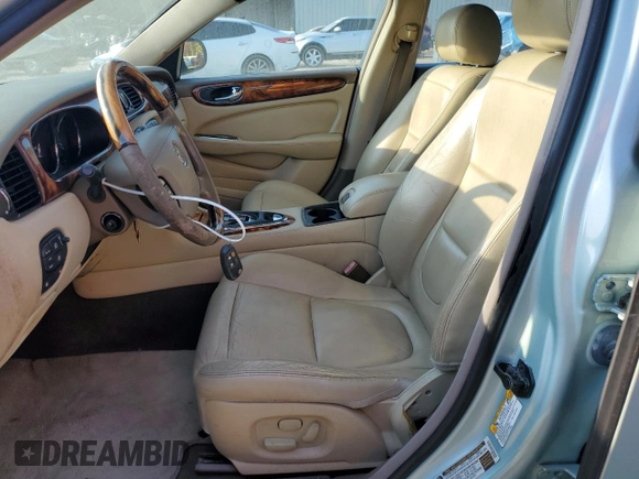 2005 Jaguar XJ with VIN SAJWA79C15SG48962, listed as a Copart auction lot 75674034 with 0 mi miles and Salvage Title. Bid and sale history available at carsss.com. Image 7.