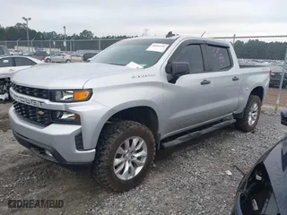2021 Chevrolet Silverado 1500 Custom with VIN 3GCPYBEK5MG162138, listed as a IAAI auction lot 40882386 with 104,537 mi miles. Bid and sale history available at carsss.com. Image 2.