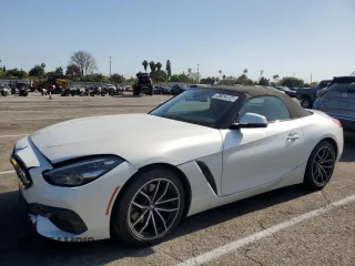 2022 BMW Z4 sDrive30i with VIN WBAHF3C02NWX82592, listed as a Copart auction lot 54182084 with 26,809 mi miles. Bid and sale history available at carsss.com. Image 1.