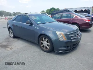 2009 Cadillac CTS AWD with VIN 1G6DS57V990120941, listed as a IAAI auction lot 42600014 with 233,456 mi miles and . Bid and sale history available at DreamBid. Image 1.