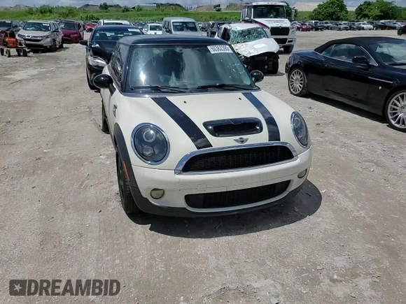 2009 MINI Hardtop S with VIN WMWMF73569TW87834, listed as a Copart auction lot 60362395 with 52,448 mi miles and Salvage title. Bid and sale history available at DreamBid. Image 13.