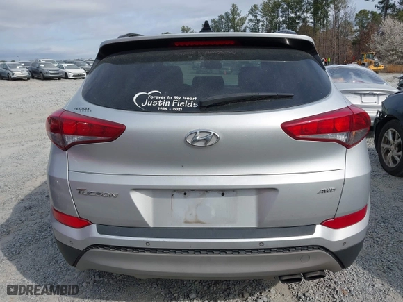 2018 Hyundai Tucson Value with VIN KM8J3CA21JU816783, listed as a IAAI auction lot 41716795 with 84,580 mi miles. Bid and sale history available at carsss.com. Image 16.