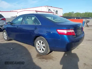 2009 Toyota Camry with VIN 4T1BE46K59U415794, listed as a IAAI auction lot 42048872 with 142,200 mi miles. Bid and sale history available at carsss.com. Image 3.