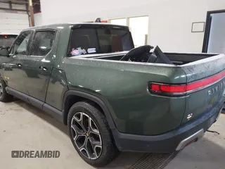 2022 Rivian R1T Adventure Package with VIN 7FCTGAAA0NN004365, listed as a IAAI auction lot 41534730 with 1 mi miles. Bid and sale history available at carsss.com. Image 3.