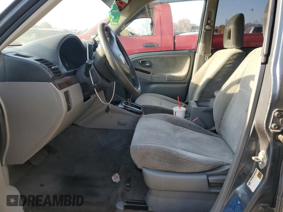 2004 Suzuki XL7 LX z VIN JS3TX92V544113643, wystawiony jako Copart lot #77832874 z przebiegiem Nie podano mil oraz Szkoda całkowita • Salvage title. Historia ofert i sprzedaży dostępna na DreamBid. Obrazek 7.