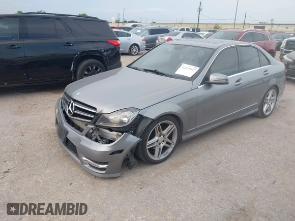 2014 Mercedes-Benz C 250 Sport with VIN WDDGF4HB7EG257087, listed as a IAAI auction lot 42169917 with 165,278 mi miles and . Bid and sale history available at DreamBid. Image 2.