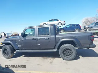 2021 Jeep Gladiator Overland z VIN 1C6HJTFG3ML588042, wystawiony jako IAAI lot #41730427 z przebiegiem 22 344 mil mil oraz . Historia ofert i sprzedaży dostępna na DreamBid. Obrazek 15.