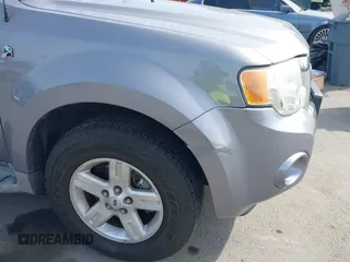 2008 Ford Escape Hybrid with VIN 1FMCU49H78KE79028, listed as a IAAI auction lot 42142396 with 131,642 mi miles and . Bid and sale history available at DreamBid. Image 6.