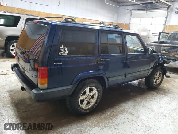 2000 Jeep Cherokee z VIN 1J4FF48S0YL153259, wystawiony jako Copart lot #52509955 z przebiegiem 204 042 mil mil oraz Czysty tytuł • Clean title. Historia ofert i sprzedaży dostępna na DreamBid. Obrazek 3.