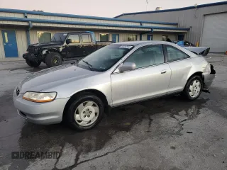 2000 Honda Accord LX z VIN 1HGCG2244YA023681, wystawiony jako Copart lot #83056564 z przebiegiem Nie podano mil oraz Szkoda całkowita • Salvage title. Historia ofert i sprzedaży dostępna na DreamBid. Obrazek 1.