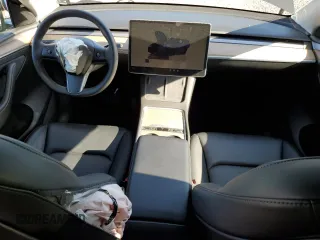 2023 Tesla Model Y Long Range z VIN 7SAYGDEE1PF865195, wystawiony jako Copart lot #57455765 z przebiegiem 32 011 mil mil oraz Szkoda całkowita • Salvage title. Historia ofert i sprzedaży dostępna na DreamBid. Obrazek 8.