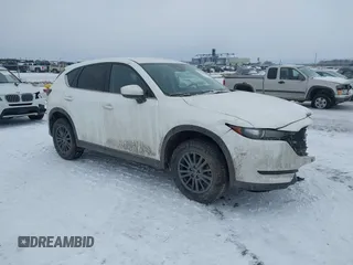 2020 Mazda CX-5 Touring z VIN JM3KFBCM6L0793625, wystawiony jako IAAI lot #41592548 z przebiegiem 48 224 mil mil oraz . Historia ofert i sprzedaży dostępna na DreamBid. Obrazek 1.