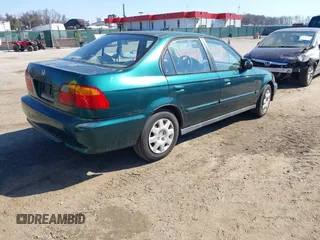 2000 Honda Civic VP with VIN 2HGEJ6615YH579906, listed as a IAAI auction lot 41683779 with 159,701 mi miles. Bid and sale history available at carsss.com. Image 4.