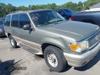 2001 Mercury Mountaineer z VIN 4M2ZU86P61UJ00123, wystawiony jako IAAI lot #42692270 z przebiegiem 261 819 mil mil oraz . Historia ofert i sprzedaży dostępna na DreamBid. Obrazek 1.
