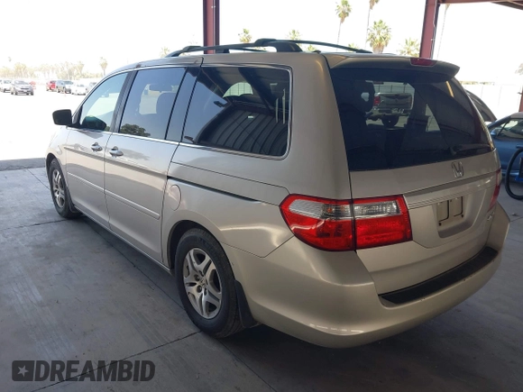 2005 Honda Odyssey EX-L with VIN 5FNRL38705B106488, listed as a IAAI auction lot 42545141 with 199,619 mi miles and . Bid and sale history available at DreamBid. Image 3.