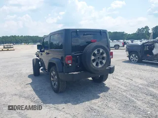2017 Jeep Wrangler Sport z VIN 1C4AJWAG0HL618140, wystawiony jako IAAI lot #42582104 z przebiegiem 77 883 mil mil oraz . Historia ofert i sprzedaży dostępna na DreamBid. Obrazek 3.