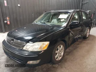 2002 Toyota Avalon XL with VIN 4T1BF28B02U257871, listed as a IAAI auction lot 41915163 with 117,995 mi miles and . Bid and sale history available at DreamBid. Image 2.