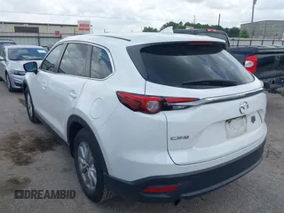 2016 Mazda CX-9 Sport z VIN JM3TCABY1G0111316, wystawiony jako IAAI lot #42085945 z przebiegiem 98 691 mil mil oraz . Historia ofert i sprzedaży dostępna na DreamBid. Obrazek 3.