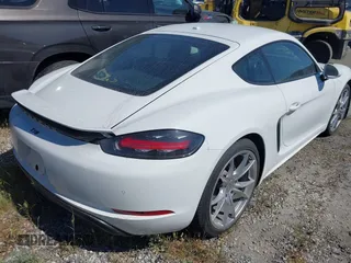 2021 Porsche Cayman with VIN WP0AA2A80MS260426, listed as a IAAI auction lot 41680025 with 19,804 mi miles and . Bid and sale history available at DreamBid. Image 4.