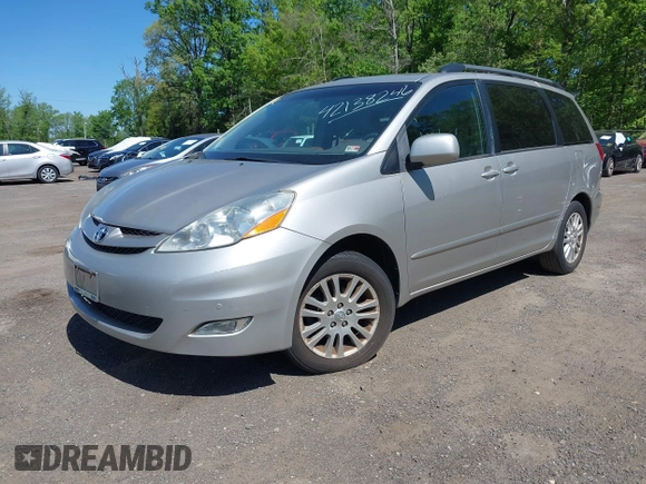 2010 Toyota Sienna XLE with VIN 5TDYK4CC3AS316002, listed as a IAAI auction lot 42138246 with 123,203 mi miles. Bid and sale history available at carsss.com. Image 2.