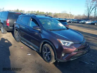 2018 Toyota RAV4 XLE with VIN 2T3RFREV0JW828321, listed as a IAAI auction lot 41714796 with 142,441 mi miles. Bid and sale history available at carsss.com. Image 1.