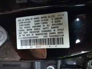 2014 Acura TSX Tech Pkg with VIN JH4CU2F63EC004301, listed as a IAAI auction lot 41588268 with 165,283 mi miles. Bid and sale history available at carsss.com. Image 9.