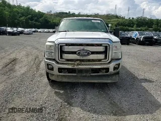 2011 Ford F-250 XL с VIN 1FT7W2B65BEA63918, выставлен на аукционе Copart как лот 61652425 с пробегом Не указан миль и Списание • Salvage title. История ставок и продаж доступна на DreamBid. Изображение 13.