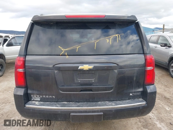 2018 Chevrolet Suburban Premier z VIN 1GNSKJKC3JR189621, wystawiony jako IAAI lot #41925416 z przebiegiem 150 775 mil mil oraz . Historia ofert i sprzedaży dostępna na DreamBid. Obrazek 16.