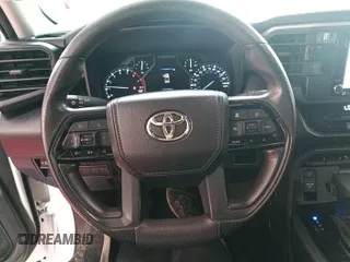 2022 Toyota Tundra SR with VIN 5TFKB5DAXNX006096, listed as a IAAI auction lot 42727998 with 44,389 mi miles and . Bid and sale history available at DreamBid. Image 25.