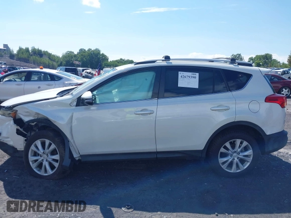 2014 Toyota RAV4 Limited with VIN 2T3DFREV0EW165977, listed as a IAAI auction lot 42679390 with 59,874 mi miles and . Bid and sale history available at DreamBid. Image 14.