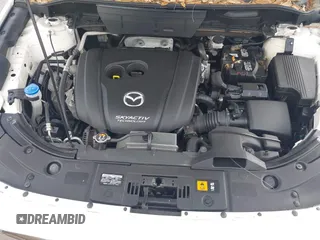 2018 Mazda CX-5 Touring z VIN JM3KFACM6J1419663, wystawiony jako IAAI lot #41879677 z przebiegiem 115 224 mil mil oraz . Historia ofert i sprzedaży dostępna na DreamBid. Obrazek 10.