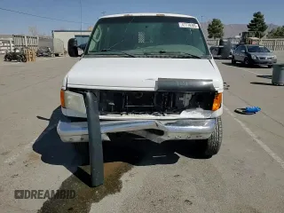 2007 Ford Econoline Cargo Commercial with VIN 1FTNE14W27DA67102, listed as a Copart auction lot 47770305 with 579,541 mi miles and Salvage Title. Bid and sale history available at DreamBid. Image 11.