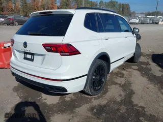 2022 Volkswagen Tiguan SE R-Line Black with VIN 3VVCB7AX8NM131565, listed as a IAAI auction lot 40769279 with 26,000 mi miles. Bid and sale history available at carsss.com. Image 4.