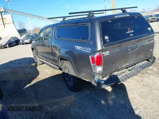 2021 Toyota Tacoma 4WD SR5 with VIN 5TFDZ5BN8MX058531, listed as a IAAI auction lot 41628820 with 102,004 mi miles. Bid and sale history available at carsss.com. Image 3.