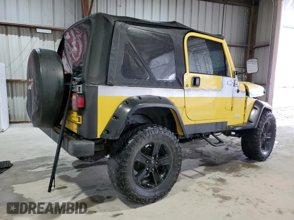 2002 Jeep Wrangler Sport z VIN 1J4FA49S02P730417, wystawiony jako Copart lot #59620865 z przebiegiem Nie podano mil oraz Szkoda całkowita • Salvage title. Historia ofert i sprzedaży dostępna na DreamBid. Obrazek 3.