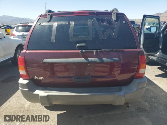 2000 Jeep Grand Cherokee Laredo with VIN 1J4G248S1YC407769, listed as a Copart auction lot 61653545 with 188,882 mi miles and Salvage title. Bid and sale history available at DreamBid. Image 6.