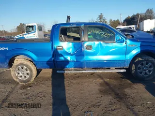 2014 Ford F-150 XL with VIN 1FTFW1EF9EKF51826, listed as a IAAI auction lot 41447705 with 144,051 mi miles. Bid and sale history available at carsss.com. Image 13.