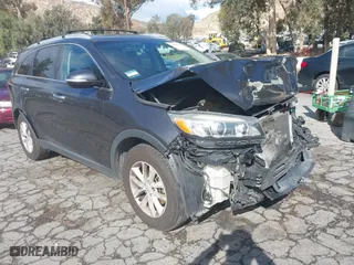 2017 Kia Sorento LX V6 with VIN 5XYPG4A52HG228342, listed as a IAAI auction lot 41430702 with 135,131 mi miles. Bid and sale history available at carsss.com. Image 1.