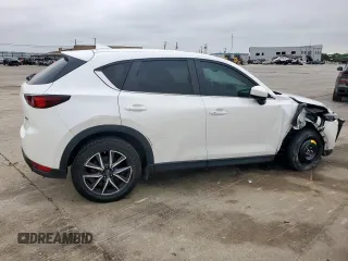 2018 Mazda CX-5 Touring z VIN JM3KFACM0J0469433, wystawiony jako Copart lot #54349955 z przebiegiem Nie podano mil oraz Szkoda całkowita • Salvage title. Historia ofert i sprzedaży dostępna na DreamBid. Obrazek 3.