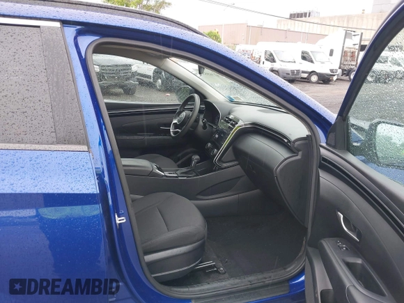 2022 Hyundai Tucson SEL z VIN 5NMJBCAE1NH026298, wystawiony jako IAAI lot #42365533 z przebiegiem 44 080 mil mil oraz . Historia ofert i sprzedaży dostępna na DreamBid. Obrazek 5.