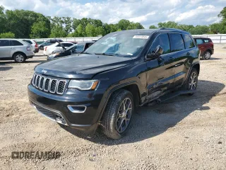 2018 Jeep Grand Cherokee Sterling z VIN 1C4RJEBG1JC181816, wystawiony jako Copart lot #56823045 z przebiegiem 100 743 mil mil oraz Szkoda całkowita • Salvage title. Historia ofert i sprzedaży dostępna na DreamBid. Obrazek 1.