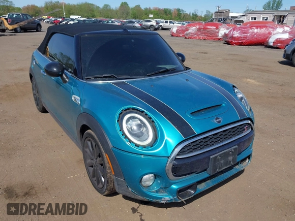 2019 MINI Convertible Cooper S с VIN WMWWG9C54K3E41195, выставлен на аукционе IAAI как лот 42149191 с пробегом 80 033 миль миль и . История ставок и продаж доступна на DreamBid. Изображение 6.