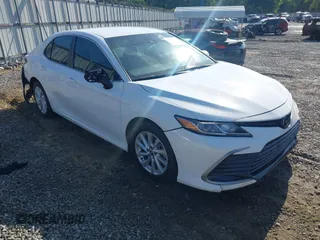 2023 Toyota Camry LE z VIN 4T1C11AK0PU830184, wystawiony jako IAAI lot #42029217 z przebiegiem 77 666 mil mil oraz . Historia ofert i sprzedaży dostępna na DreamBid. Obrazek 1.