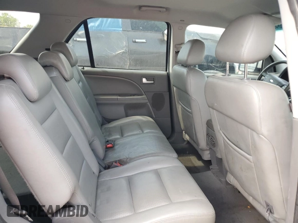 2006 Ford Freestyle SEL with VIN 1FMDK05126GA32604, listed as a Copart auction lot 63868405 with 220,530 mi miles and Salvage title. Bid and sale history available at DreamBid. Image 11.