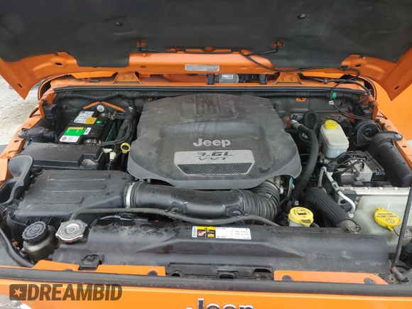 2013 Jeep Wrangler Unlimited Rubicon with VIN 1C4BJWFGXDL545866, listed as a Copart auction lot 59788115 with 102,617 mi miles and Salvage title. Bid and sale history available at DreamBid. Image 12.