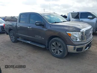 2018 Nissan Titan SV with VIN 1N6AA1E64JN502421, listed as a IAAI auction lot 40735048 with 71,256 mi miles. Bid and sale history available at carsss.com. Image 1.