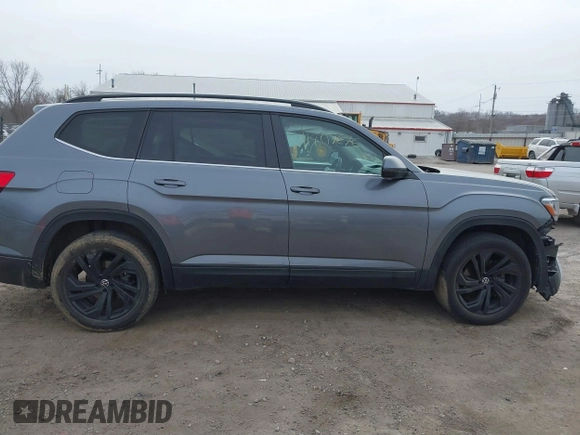 2021 Volkswagen Atlas SE with VIN 1V2KR2CA0MC570498, listed as a IAAI auction lot 41807676 with 56,434 mi miles and . Bid and sale history available at DreamBid. Image 14.