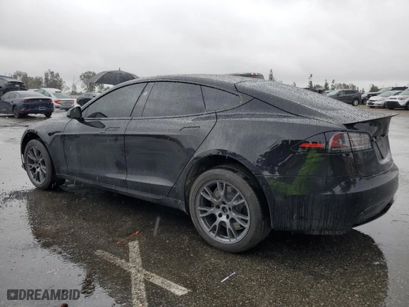 2023 Tesla Model S with VIN 5YJSA1E59PF514540, listed as a Copart auction lot 45308895 with 24,165 mi miles and Salvage Title. Bid and sale history available at carsss.com. Image 2.